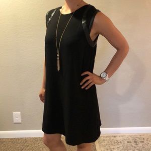Black sleeveless shift dress